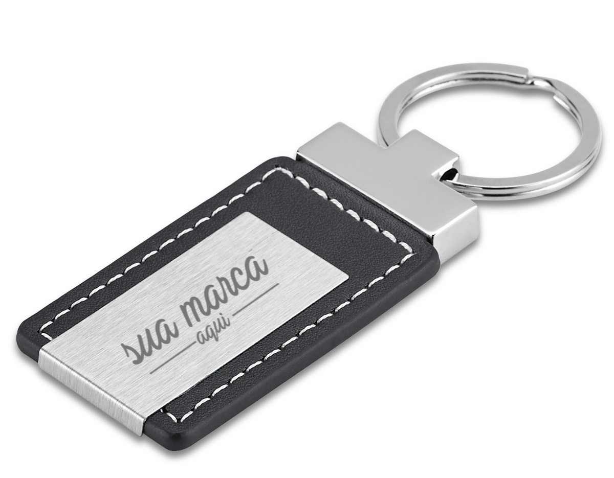Chaveiro de couro sintético e metal. Incluso caixa.