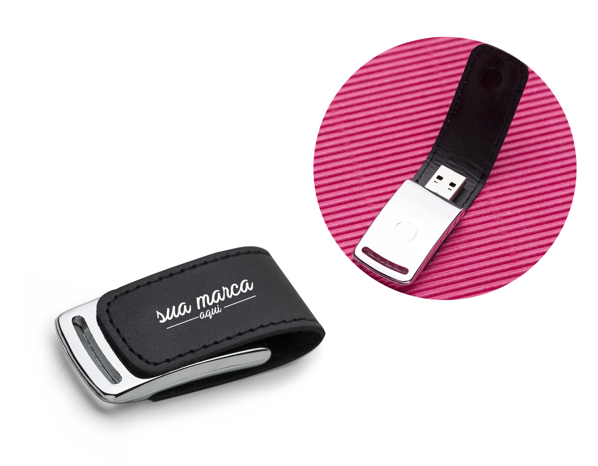 Pen drive de couro 4GB com costura preta e detalhe prata(linha vazada na parte inferior do metal). Possui imã para abrir/fechar.
