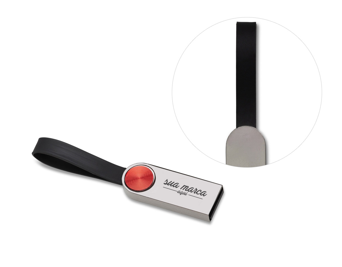 Pen drive metálico na cor grafite com detalhe circular vermelho na parte frontal e verso liso, possui alça emborrachada preta. Capacidades de 8GB 