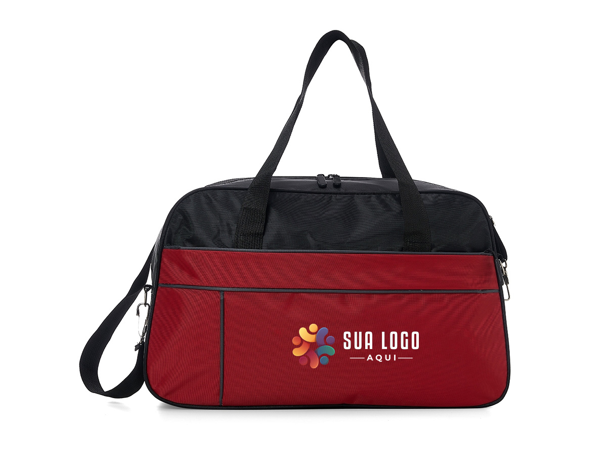 Bolsa de poliéster impermeável com capacidade de 33 litros. Possui compartimento principal com amplo espaço e um pequeno bolso interno para acessórios, além de um bolso frontal longo. A bolsa contém alças de nylon para mãos, alça transversal regulável, duas fivelas superiores para encaixe da alça transversal, zíperes com puxadores emborrachado e revestimento interno de poliéster.