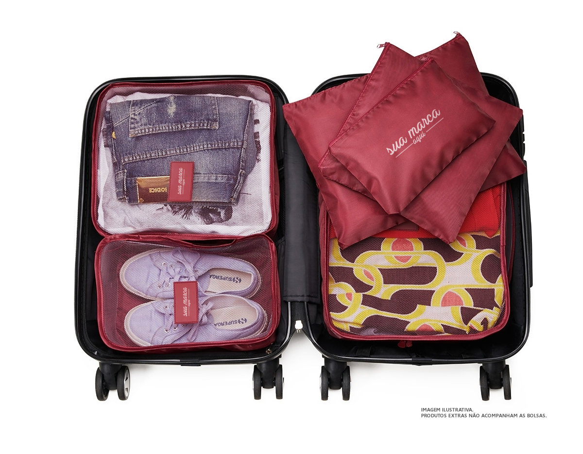 Kit necessaire com 6 peças confeccionadas em nylon. O cojunto de necessaires possui tamanhos diferenciados, sendo 3 unidades com: alça para transporte, zíperes com pegadores emborrachados, parte frontal com malha de nylon e plaquinha emborrachada para personalização; possui também 3 unidades de necessaires em nylon inteiramente lisas e impermeáveis