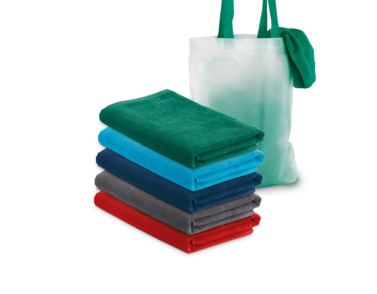 Toalha de praia em veludo de algodão (320 g/m²), disponível em várias cores. Fornecida com sacola em non-woven (80 g/m²). 1500 x 750 mm | Sacola: 330 x 415 x 100 mm