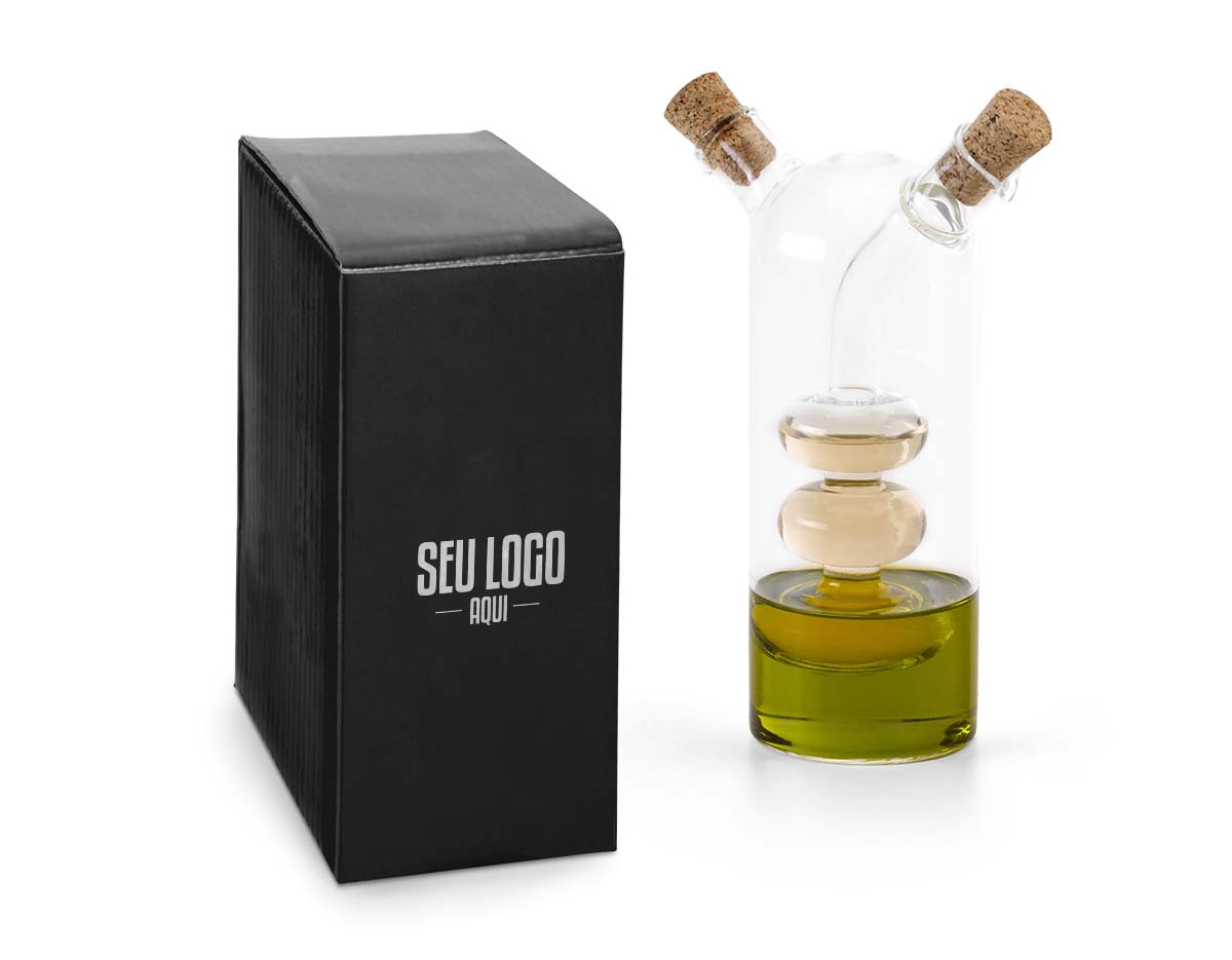 Galheteiro em vidro que contém dois reservatórios com capacidades de até 50 ml e de até 250 ml. O galheteiro contém duas rolhas de cortiça.