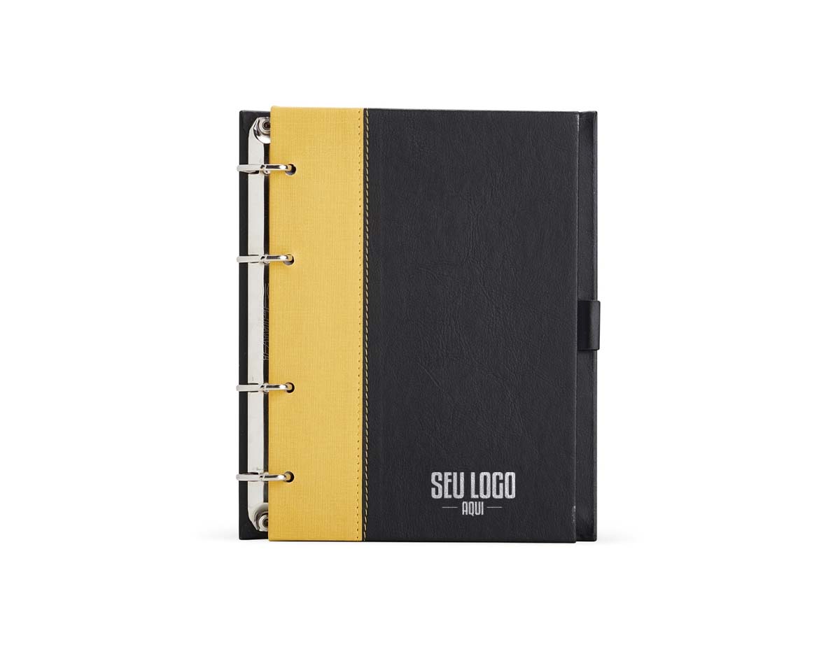 Caderno fichário em couro sintético. Possui suporte na lateral para caneta ( não acompanha) e aproximadamente 100 folhas.