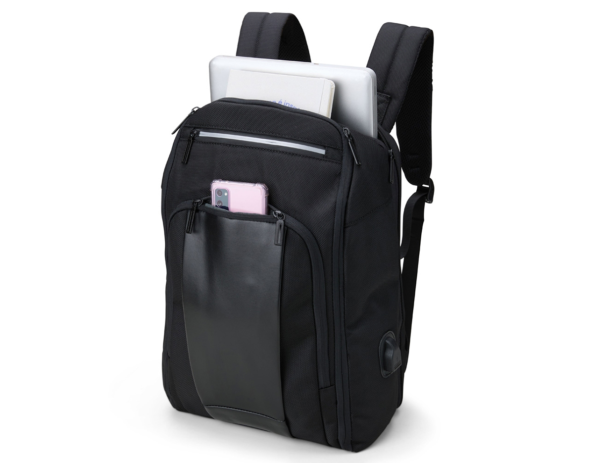 Mochila confeccionada em Nylon 23 litros com detalhes em couro sintético. Contém 5 compartimentos, sendo um bolso com faixa refletiva, divisórias internas para acessórios, bolso para tablet e notebook 15.6, bolso antifurto nas costas, bolso externo na lateral com elástico, suporte externo USB, alça para encaixe em malas de viagem, alças da mochila possuem bolsos integrados para suporte de óculos e cartões.