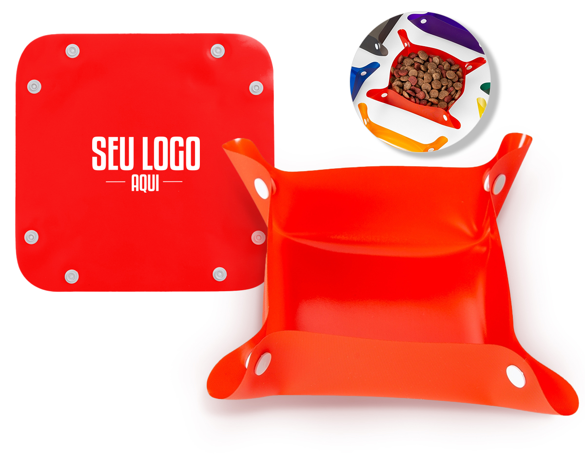 Bebedouro e comedouro para pets. Material plástico, basta juntar os botões das laterais para formar uma espécie de tigela.