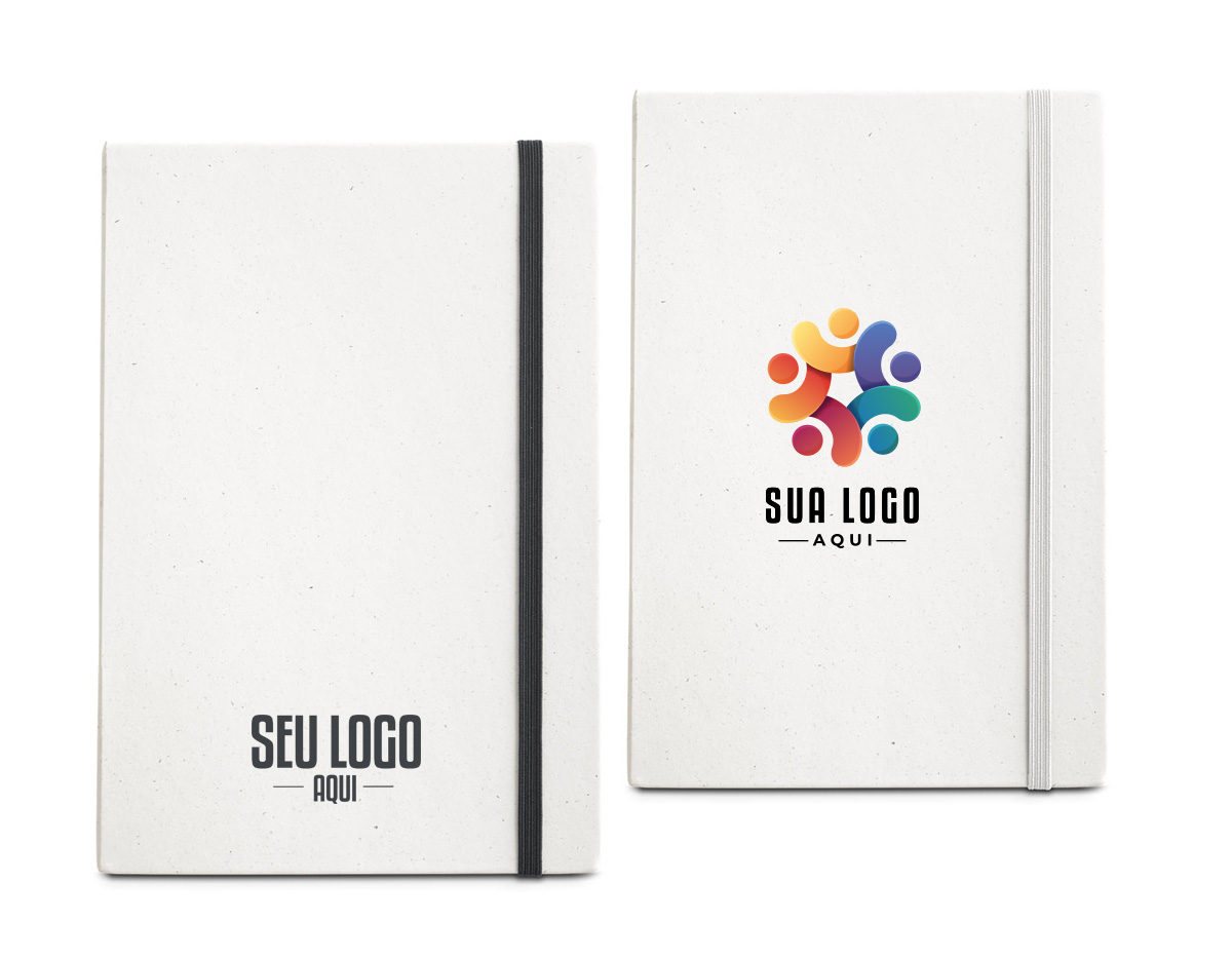 Caderno A5 de capa dura, fabricado a partir de embalagens de leite recicladas, contribuindo para o reaproveitamento do cartão e alumínio. Possui 80 folhas pautadas em papel reciclado, na cor marfim, além de fita separadora e elástico para fechamento, oferecendo praticidade e sustentabilidade.