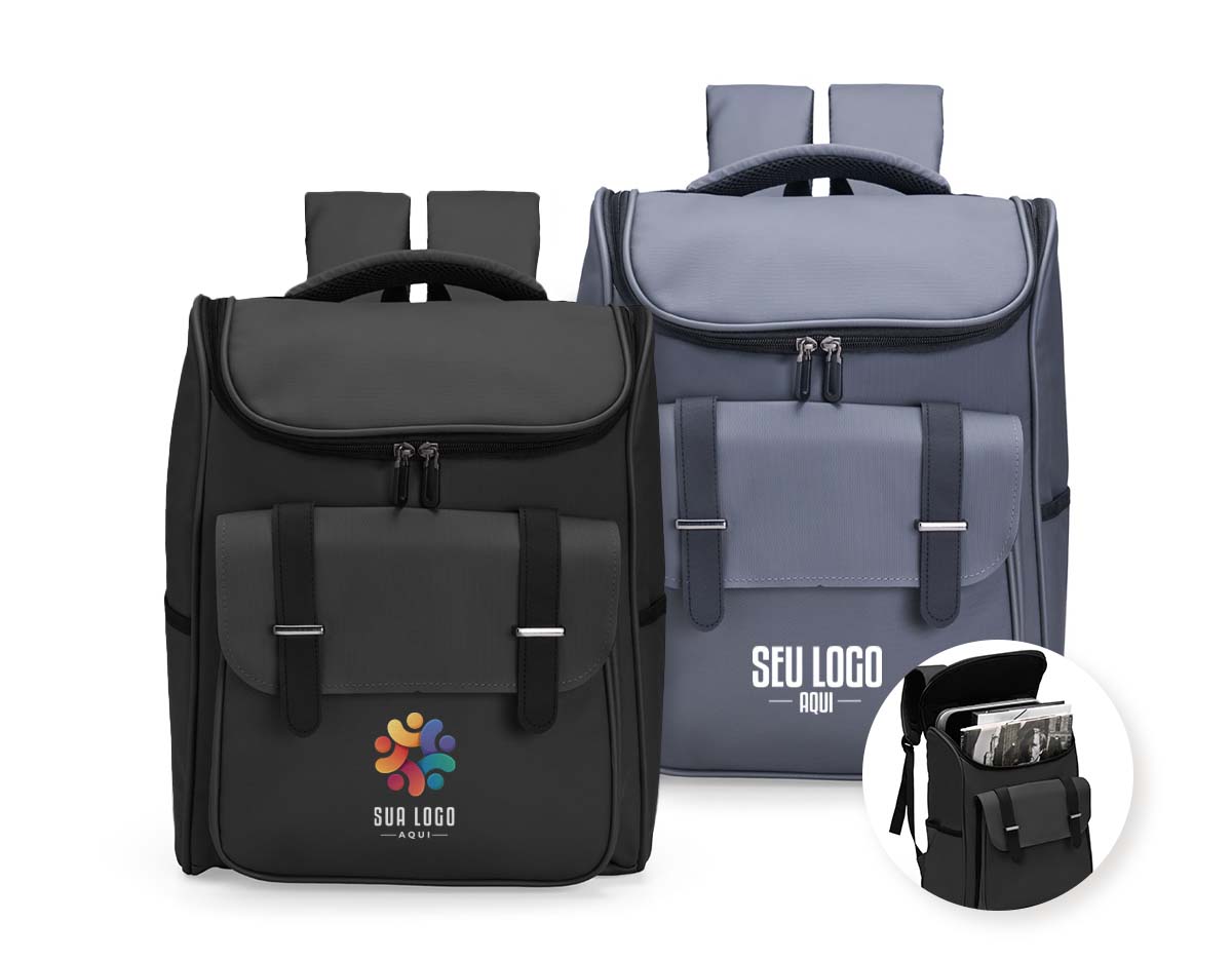 Mochila executiva em couro sintético resistente à água, com compartimento principal amplo, dois bolsos acolchoados para notebooks de até 14", bolso frontal com fivela e botão magnético, dois bolsos laterais, engate para mala e alças acolchoadas. Ideal para praticidade e conforto no dia a dia.