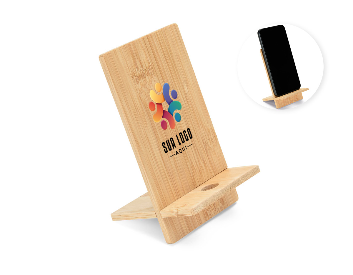 Suporte para celular em bambu, desmontável em duas partes, ideal para uso em mesas e escritórios. Possui orifício que permite carregar o aparelho enquanto está apoiado. Um brinde corporativo funcional, elegante e com apelo ecológico.