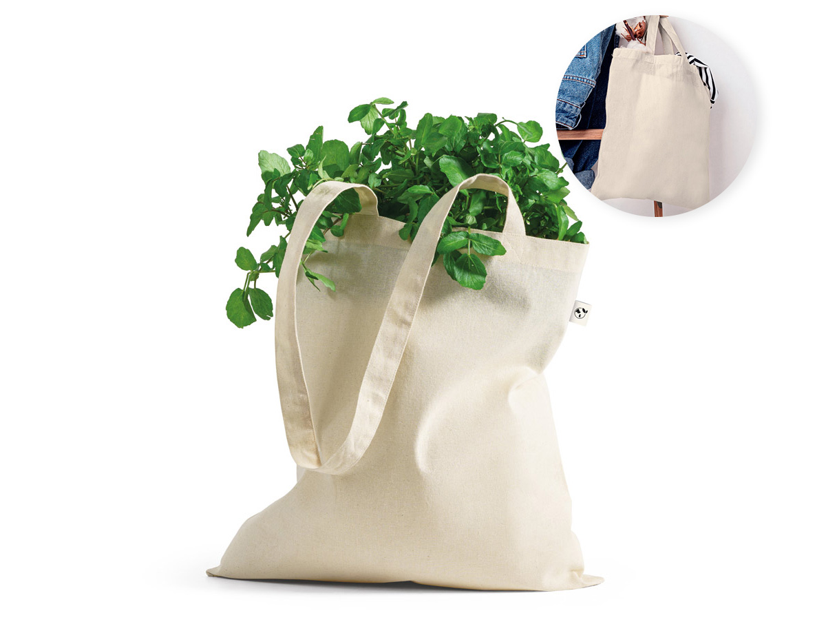 Sacola ecológica confeccionada em 100% algodão orgânico de 140 g/m², resistente e sustentável. Possui alças reforçadas de 65 cm, ideais para carregar no ombro com conforto. Perfeita para o dia a dia, compras ou ações promocionais que valorizam o cuidado com o meio ambiente.