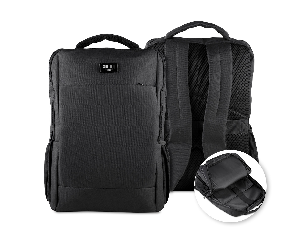 Mochila em poliéster 600D, com interior em poliéster 210D e capacidade de 13L, ideal para o dia a dia corporativo. Conta com plaquinha metálica imantada para personalização, bolso frontal com zíper, dois bolsos laterais e engate para mala de viagem. Possui dois compartimentos com divisórias internas e espaço acolchoado para notebook de até 15,6”, unindo praticidade, organização e elegância como brinde corporativo.