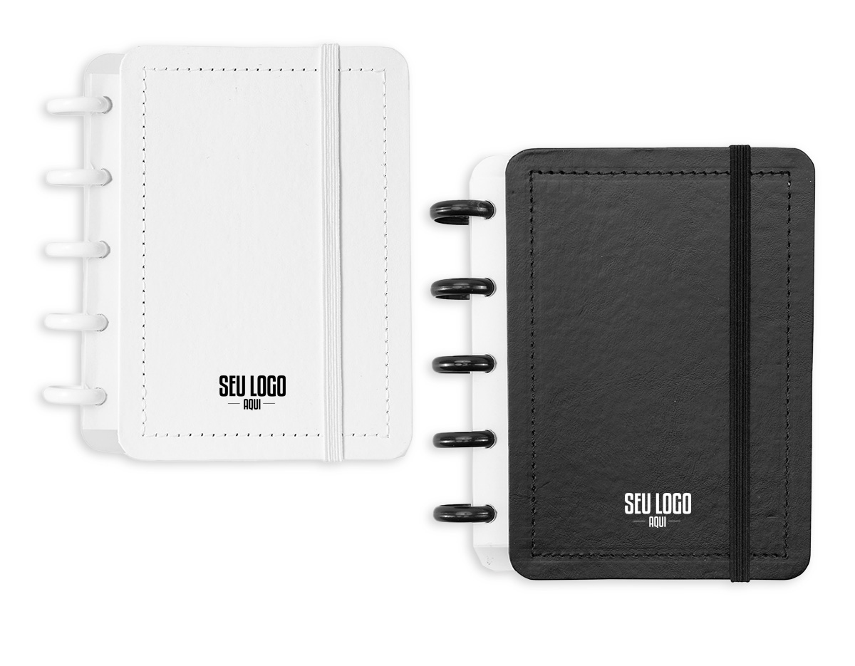 Caderno de capa dura em percalux, com fechamento em elástico e encadernação em discos plásticos reposicionáveis, que permitem adicionar ou retirar folhas compatíveis. Inclui páginas para dados pessoais, calendários de 2025 a 2027, datas importantes, planejamento trimestral e uma página com instruções para troca de folhas. Conta ainda com aproximadamente 62 folhas pautadas brancas.