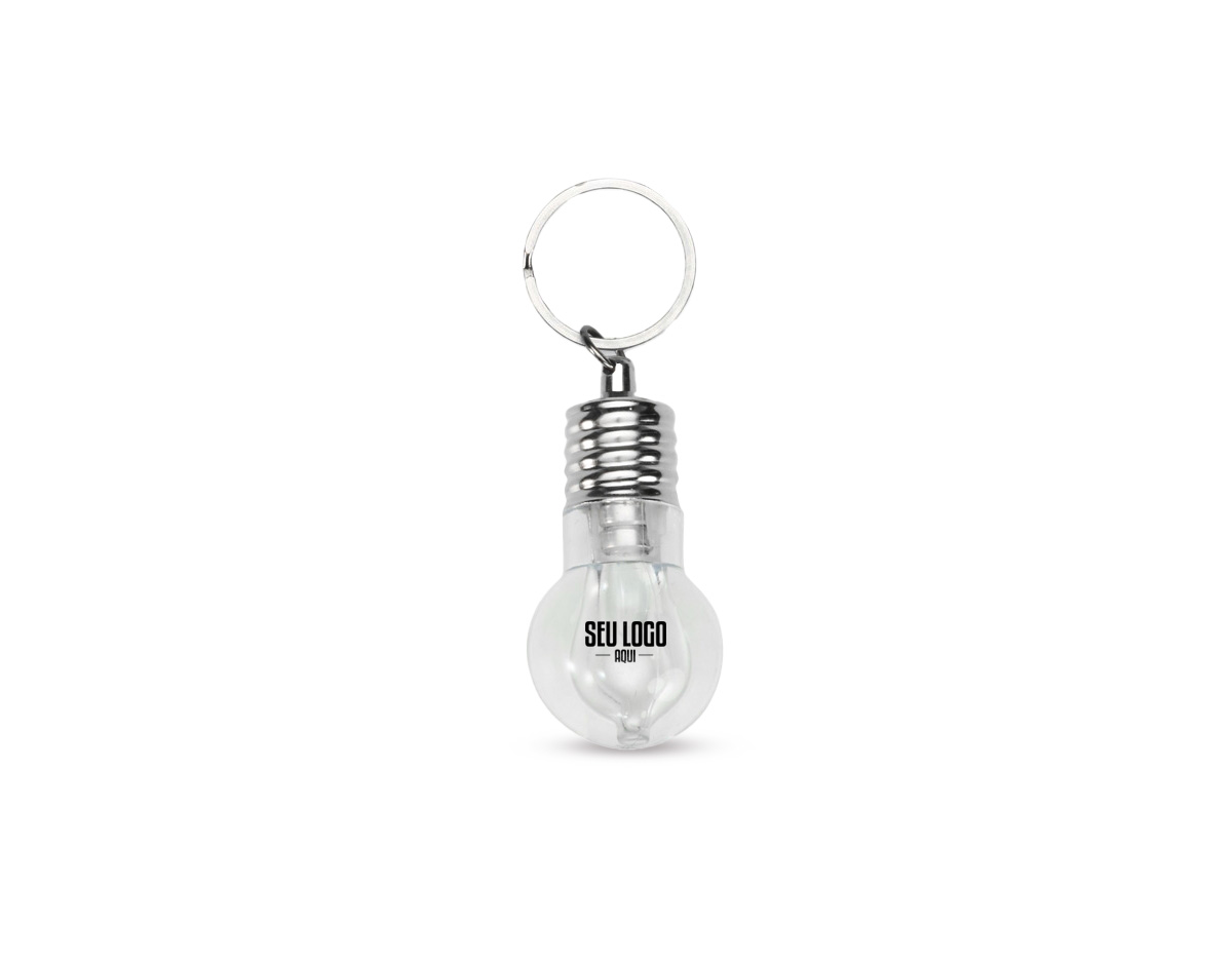 Chaveiro em formato de lâmpada, produzido em plástico e metal, com design criativo e funcional. Possui iluminação em LED acionada por botão, ideal para uso em ambientes com pouca luz ou situações emergenciais. Acompanha três baterias LR41 já embutidas, prontas para uso. Um brinde corporativo diferenciado, prático e de grande apelo promocional, perfeito para valorizar a marca no dia a dia.